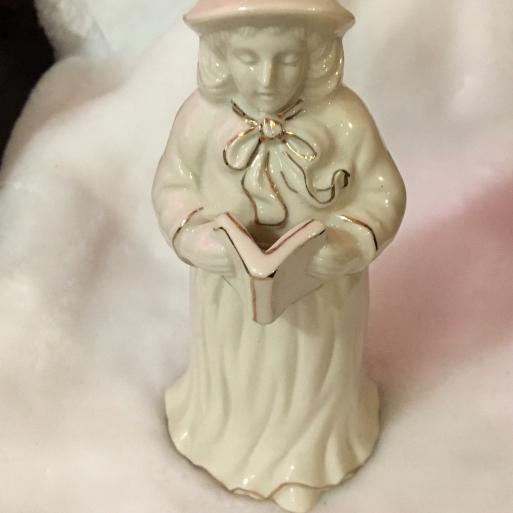 Cream Ceramic Figurine with Book